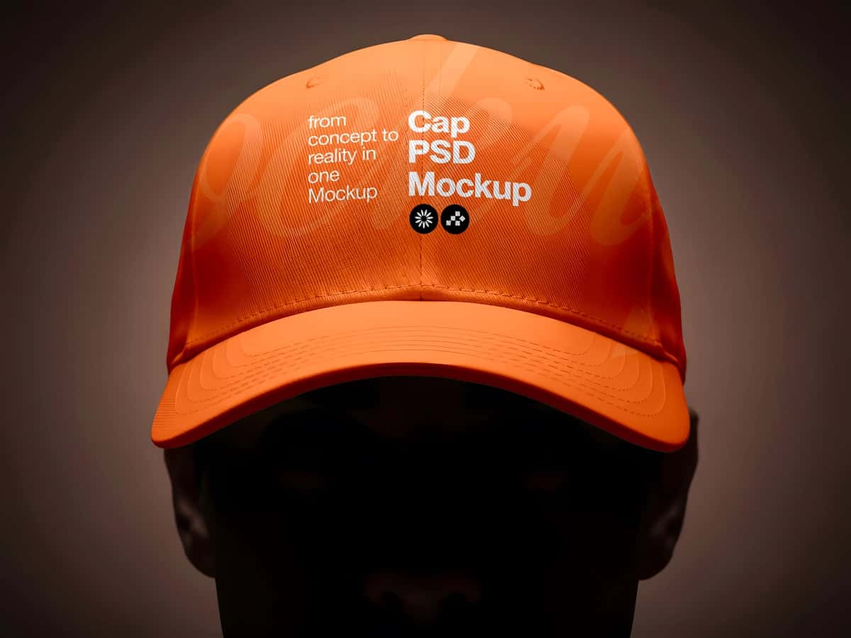 To'q sariq beysbol kepkasi, dramatik yorug'lik bilan bezatilgan psd maket boshi | Orange baseball cap psd mockup head with dramatic lighting 1