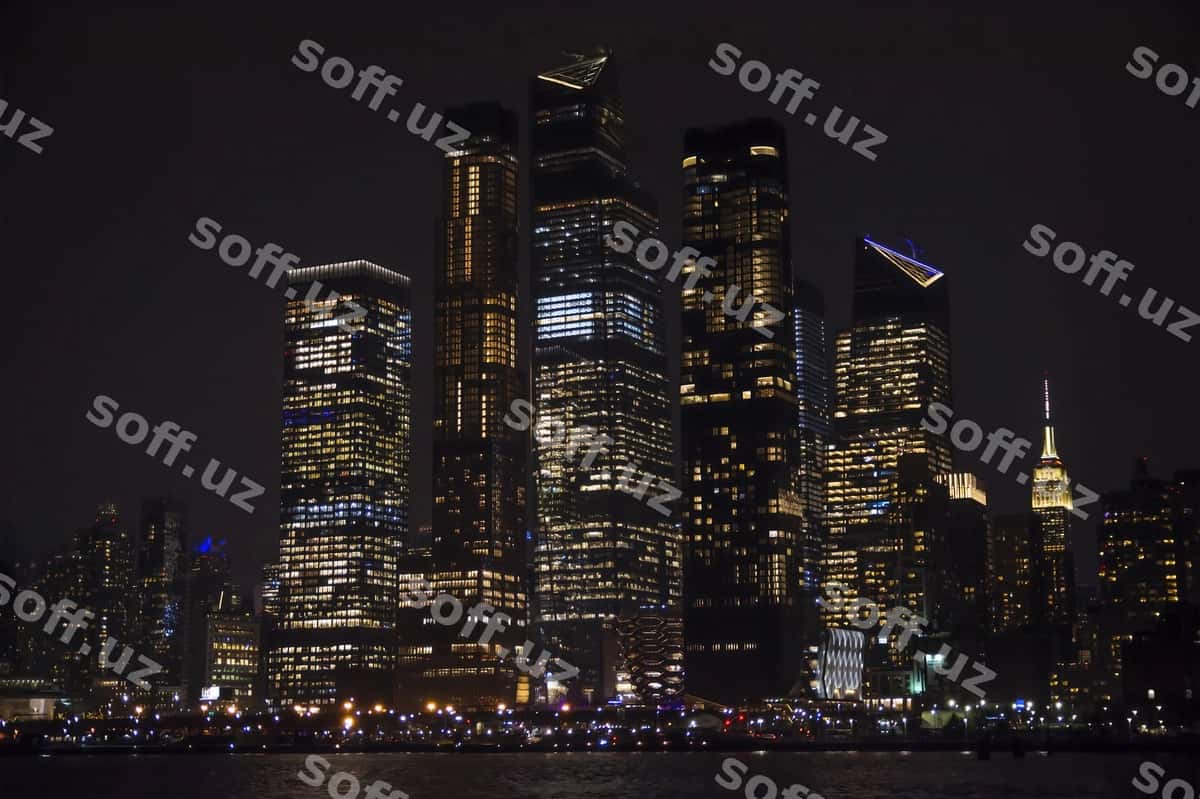 Yorqin binolar tundagi osmon orqali | Illuminated buildings against sky night 1