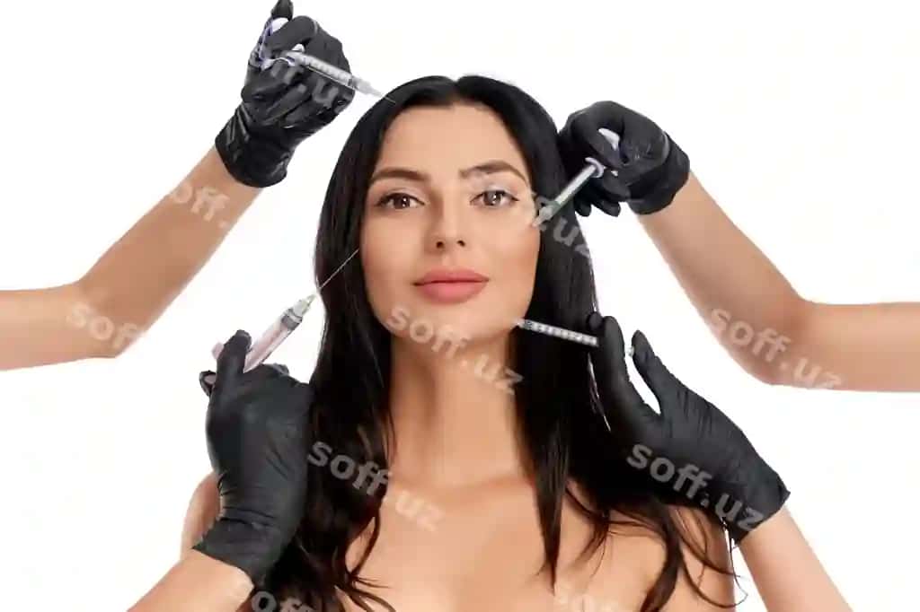 Jozib ayol ikki kosmetologdan go'zallik jarayonlarini qabul qilmoqta. | Attractive woman getting beauty procedures from two cosmetologist
