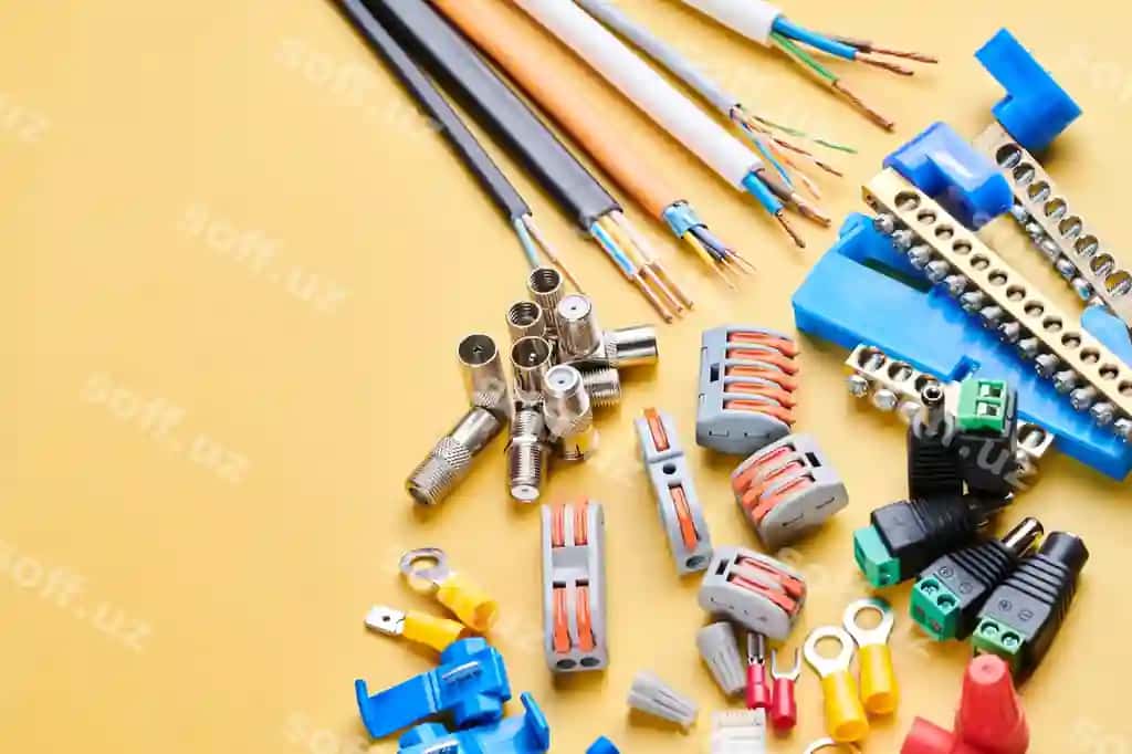 Turli xil elektr asboblari izolyatsiya qilingan sariq fon elektrik uskunalari simlari terminallar ulagichlar sug'urta kalitlari | Different electrical tools isolated yellow background electrician equipment wires terminals connectors fuses switches