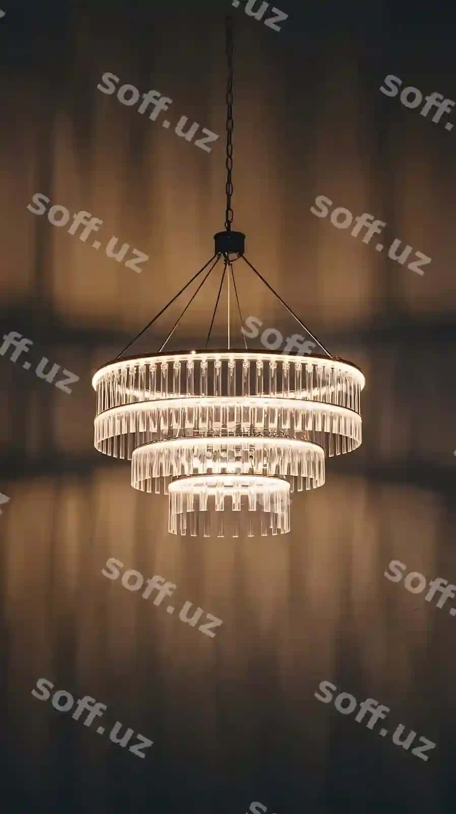 To'q kulrang fonni yorituvchi nafis tasvirli ko'p halqali qandil | Elegant image multiring chandelier illuminating dark grey background