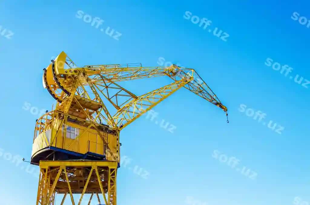 Pastoral burchakdan ko'rinishda sariq qor aniq ko'k osmon fonida quyoshli kun | Low angle view yellow crane against clear blue sky sunny day