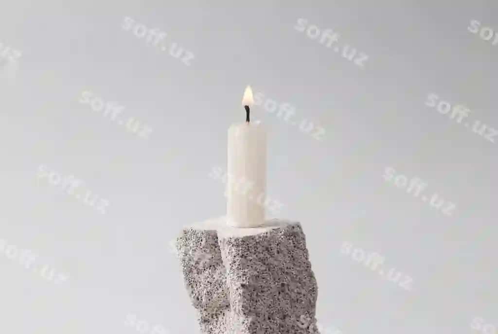 Flaming candle stone gray background minimal concept | Flaming candle stone gray background minimal concept