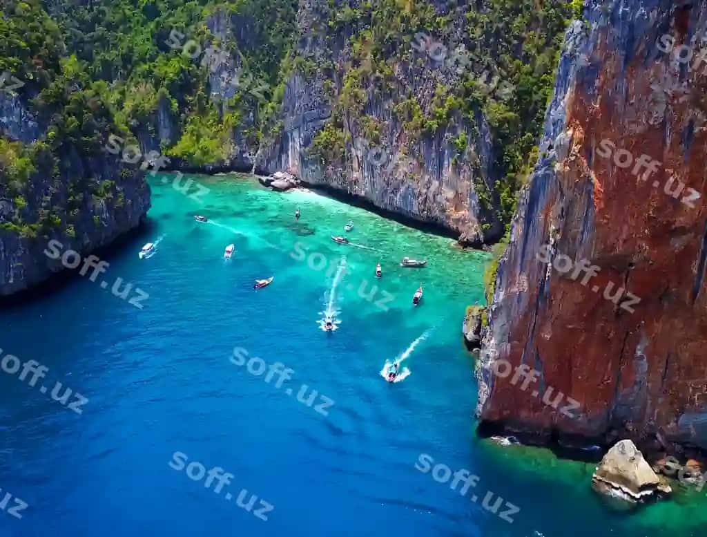 Manzarali ko'rinish dengizi toshlar o'rtasida | Scenic view sea amidst rock formation