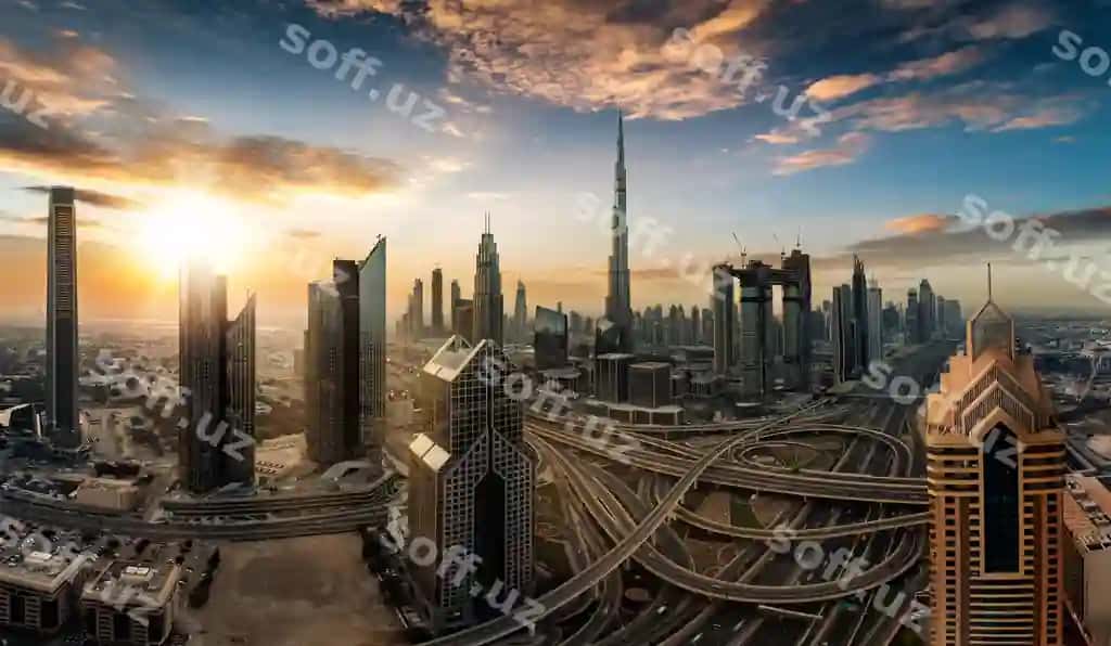 Quyosh botayotgan osmon fonidagi shahar manzarasi | Cityscape against sky sunset