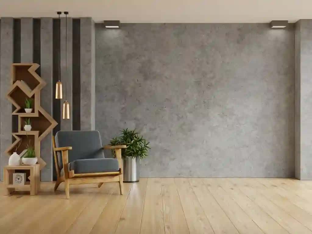 Kresloli bo'sh beton devorli yashash xonasining ichki qismidagi loft | Living room interior style loft with armchair empty concrete wall