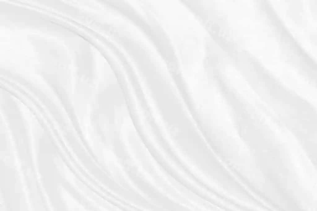 Silliq, nufuzli, oq hinor satin hashamatli mato teksturasi turmova yoki hashamatli orqa fon dizayni sifatida ishlatish mumkin. | Smooth elegant white silk satin luxury cloth texture can use as wedding background luxurious background design