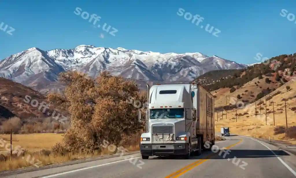 Tiniq moviy osmon fonida qor bilan qoplangan tog'larning manzarali manzarasi | Scenic view snowcapped mountains against clear blue sky