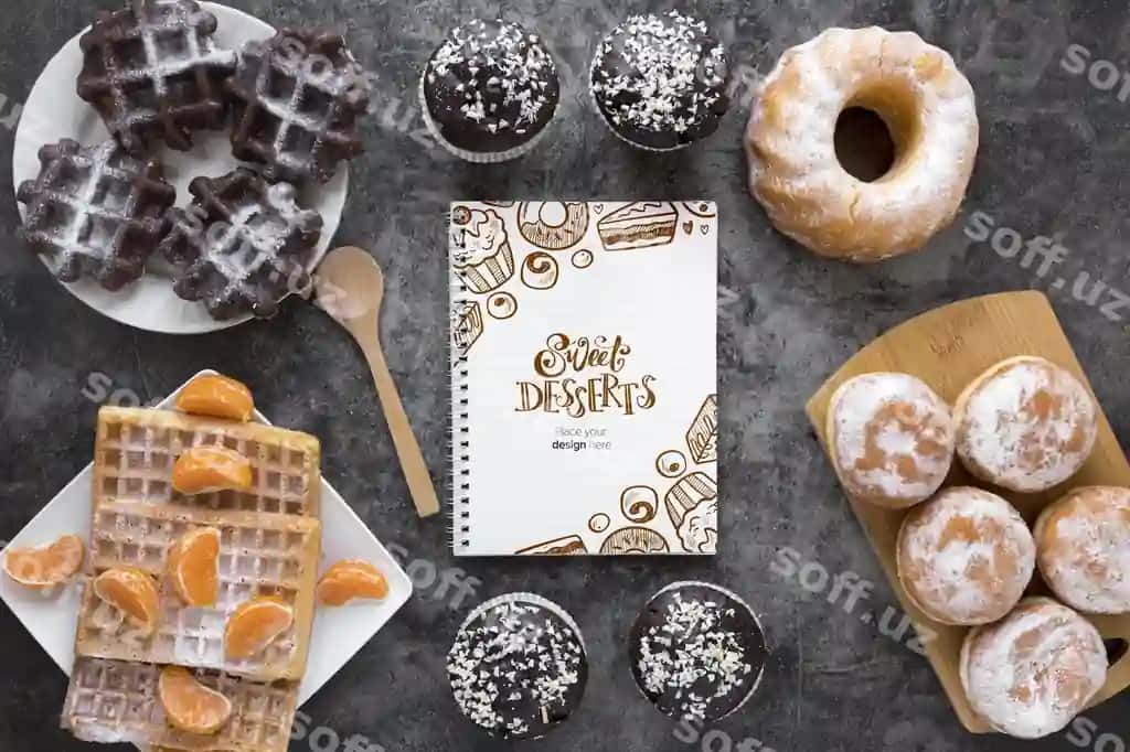 Mevali daftarli shirinliklar assortimentining yuqori ko'rinishi | Top view assortment desserts with fruit notebook