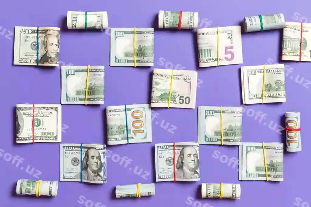 Pul bilan ranglangan AQSH yuz dollari chiqimlari yuqori ko'rinish matn joylashuvchi joy bilan siz uchun biznes matni | Colored with money american hundred dollar bills top wiev with copyspace your text business