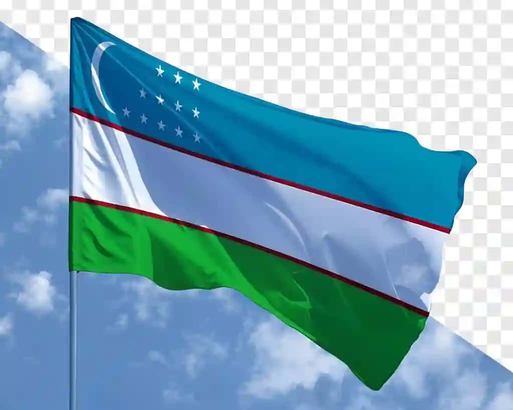 O'zbekiston bayrog'i ko'k osmonga qarshi shamolni silkitmoqda | Flag uzbekistan waving wind against blue sky