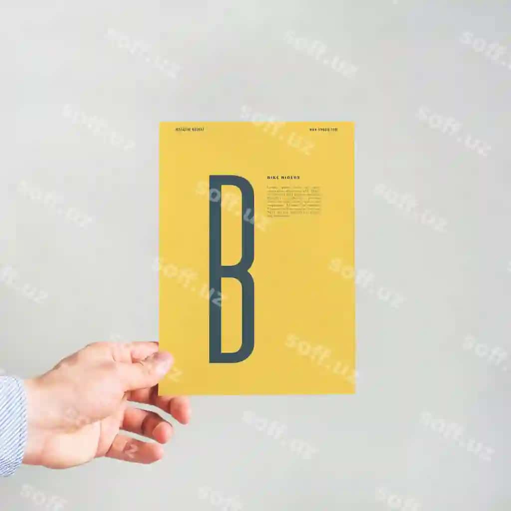 Sariq qog'oz maketini ushlab turgan qo'l | Hand holding yellow paper mockup