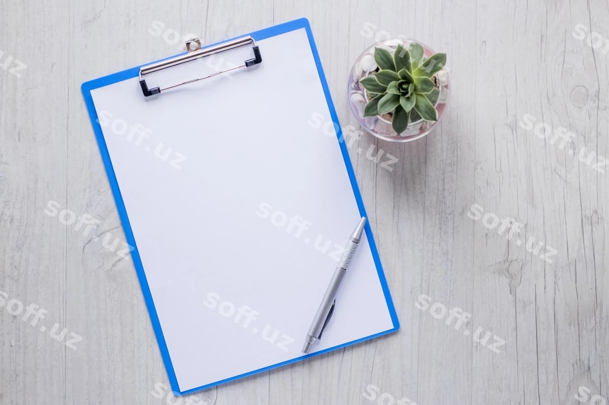 Ruchka doska bitkin yonida | Pen clipboard near plant